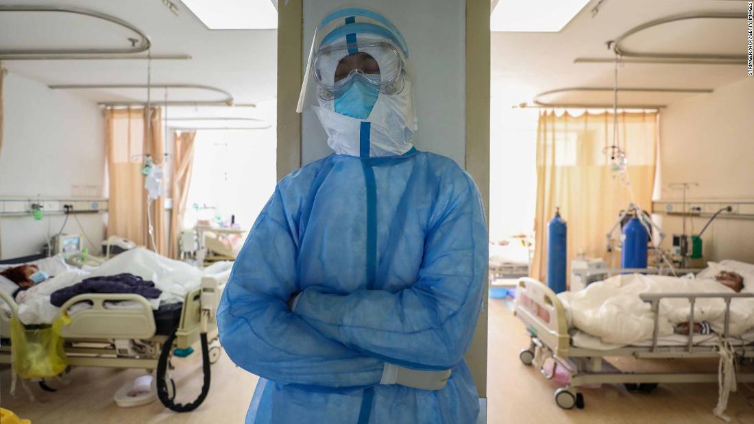 A medical worker rests at the isolation ward of the Red Cross hospital in Wuhan on February 16.